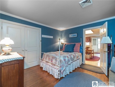 Welcome to 4896 Ashville Bay Road, a rare lakefront retreat on - photo 18