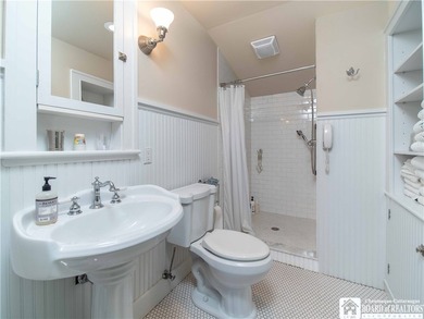 Welcome to 4896 Ashville Bay Road, a rare lakefront retreat on - photo 24