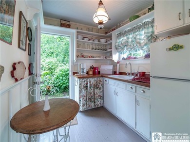 Welcome to 4896 Ashville Bay Road, a rare lakefront retreat on - photo 34