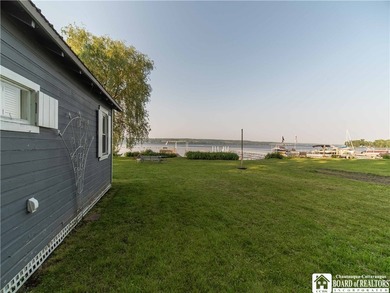 Welcome to 4896 Ashville Bay Road, a rare lakefront retreat on - photo 38