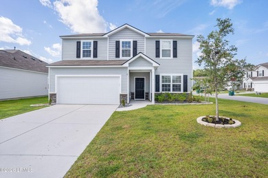 Welcome to 1 Toxaway Lane, where modern comfort meets Lowcountry - photo 1