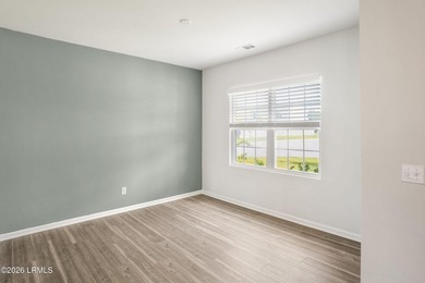 Welcome to 1 Toxaway Lane, where modern comfort meets Lowcountry - photo 4