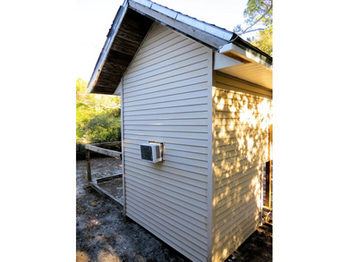 This 3-bedroom, 2-bath 1960 cottage offers a simple, comfortable - photo 8