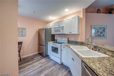 Sunshine, lake views, and easy Florida living. This first-floor - photo 11