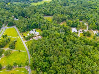 Nestled among majestic live oaks and the natural beauty that - photo 11