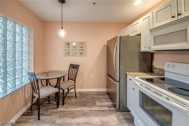 Sunshine, lake views, and easy Florida living. This first-floor - photo 12