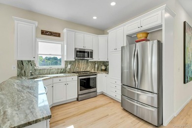 Minutes from Westhampton Beach Village, 56 South Country Road is - photo 12