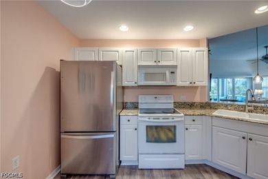 Sunshine, lake views, and easy Florida living. This first-floor - photo 13