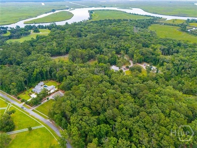 Nestled among majestic live oaks and the natural beauty that - photo 13