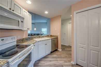 Sunshine, lake views, and easy Florida living. This first-floor - photo 14