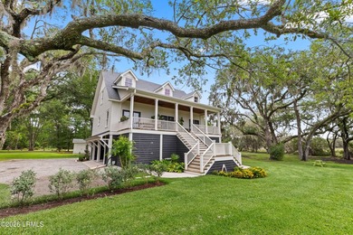 A rare waterfront estate offering over two acres, a private dock - photo 1