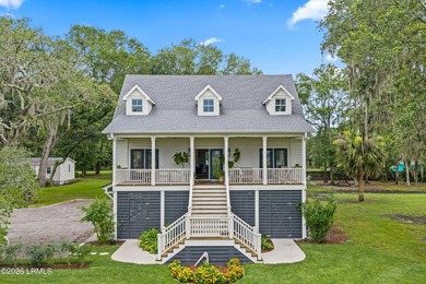 A rare waterfront estate offering over two acres, a private dock - photo 2
