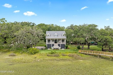 A rare waterfront estate offering over two acres, a private dock - photo 3