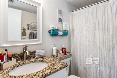 End unit with TWO Lagoon-view balconies and updated finishes! - photo 5