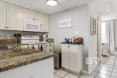 End unit with TWO Lagoon-view balconies and updated finishes! - photo 7