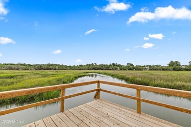 A rare waterfront estate offering over two acres, a private dock - photo 8