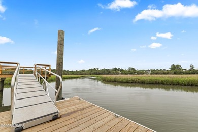 A rare waterfront estate offering over two acres, a private dock - photo 10