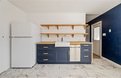 Welcome to this beautifully designed 3-bedroom, 2-bathroom brick - photo 13