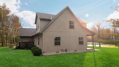 406' of Lake St. Helen frontage and a stunning home nestled on - photo 38