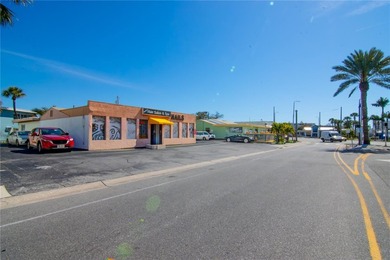 Positioned along Gulf Boulevard at 59th Avenue, this - photo 9