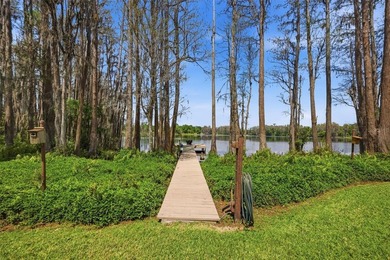 Positioned along the shores of Lake Kell in Lutz, this is a rare - photo 3
