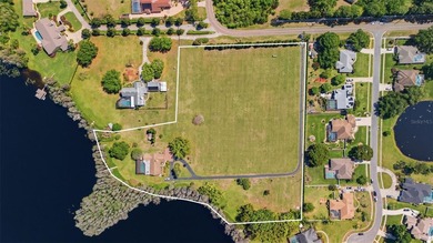 Positioned along the shores of Lake Kell in Lutz, this is a rare - photo 4
