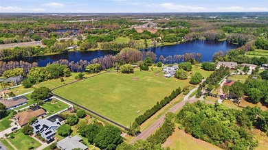 Positioned along the shores of Lake Kell in Lutz, this is a rare - photo 5