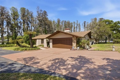 Positioned along the shores of Lake Kell in Lutz, this is a rare - photo 10