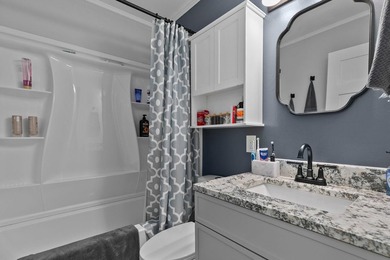COMPLETELY RENOVATED and move-in ready! This stunning 3-bedroom - photo 18