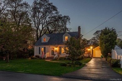 Charming four-bedroom, two bath Cape Cod located in Islip - photo 2