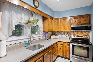 Charming four-bedroom, two bath Cape Cod located in Islip - photo 3