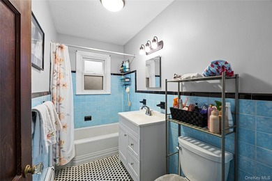 Charming four-bedroom, two bath Cape Cod located in Islip - photo 9