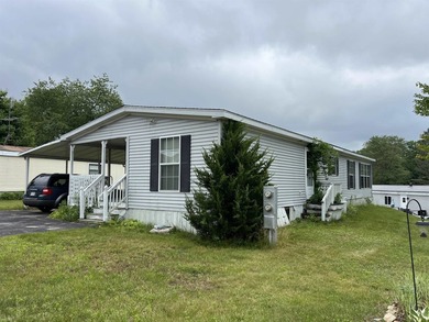 Welcome to this 2-bedroom, 2-bath double-wide located in the - photo 1