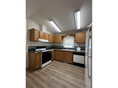 Welcome to this 2-bedroom, 2-bath double-wide located in the - photo 6