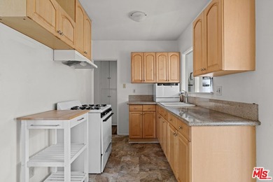 DELIVERED WITH ONE UNIT VACANT! Welcome to 1630 Franklin Street - photo 13