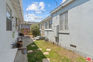 DELIVERED WITH ONE UNIT VACANT! Welcome to 1630 Franklin Street - photo 23