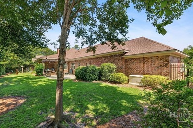 Nestled beneath majestic Live Oaks in the sought-after gated - photo 27