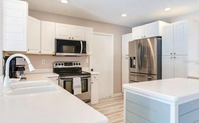 This well-maintained 3-bedroom, 2-bathroom pool home offers a - photo 8