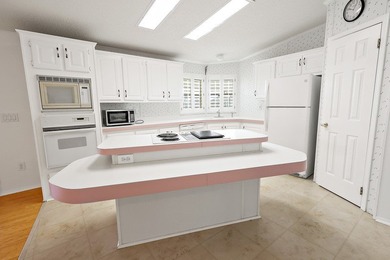 Live the Florida lifestyle in sought-after Barefoot Bay! This 1 - photo 6