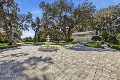 A rare, privately gated residence set on nearly 5 acres in - photo 11