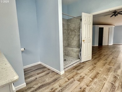 This spacious triple-wide manufactured home offers 3 bedrooms, 2 - photo 11