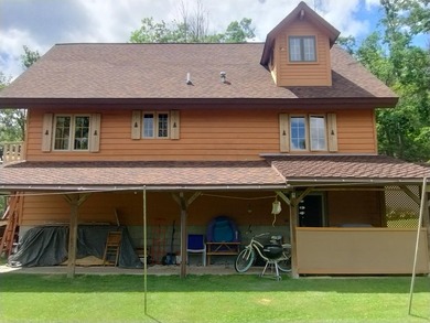 This unique home has incredible, beachfront on scenic Ess Lake - photo 11