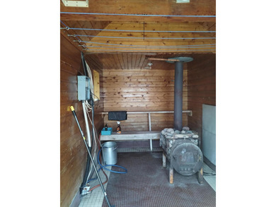 This unique home has incredible, beachfront on scenic Ess Lake - photo 15