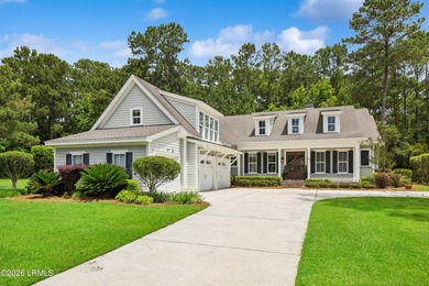 Nestled on a private wooded homesite in Hampton Hall, this - photo 3
