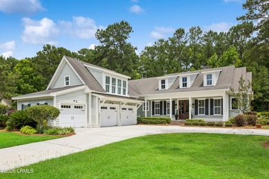 Nestled on a private wooded homesite in Hampton Hall, this - photo 4