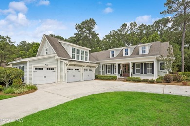 Nestled on a private wooded homesite in Hampton Hall, this - photo 5