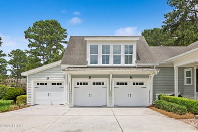 Nestled on a private wooded homesite in Hampton Hall, this - photo 6
