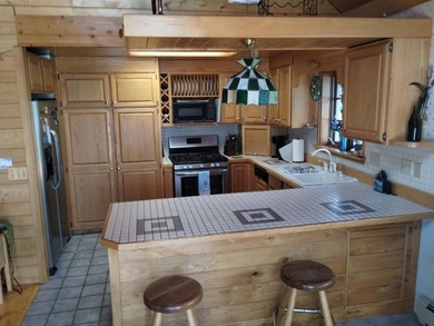 This unique home has incredible, beachfront on scenic Ess Lake - photo 26