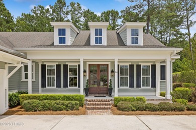 Nestled on a private wooded homesite in Hampton Hall, this - photo 7