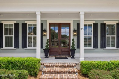 Nestled on a private wooded homesite in Hampton Hall, this - photo 8